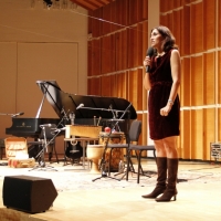 Sanam Akhlagh, Pardis for Children's executive Director, speaking at Songs of Pardis concert at the Merkel Hall